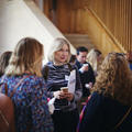 A group of women networking at a conference