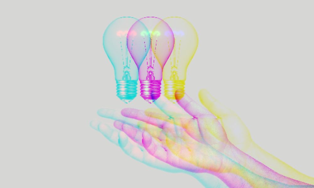 A hand outstretched with a lightbulb hovering over it with a trippy design